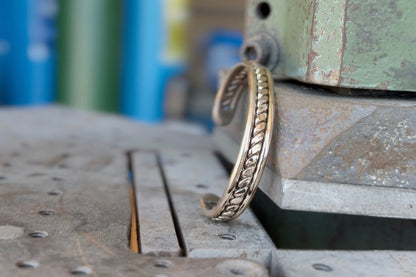 Single Bronze Twist Cuffs